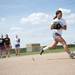 Lincoln senior Raven Lee runs to throw a ball to second during practice on Tuesday, May 7. Daniel Brenner I AnnArbor.com